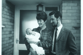Vintage photo of Phyllis Foster Satter ’62 and Keith Johnson ’62 holding their baby